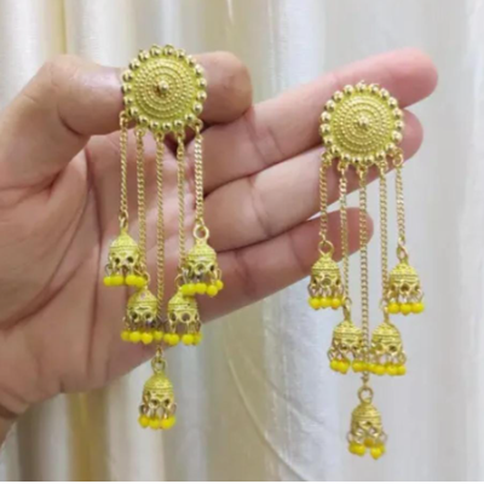 traditional long tassel jhumka earrings gold design