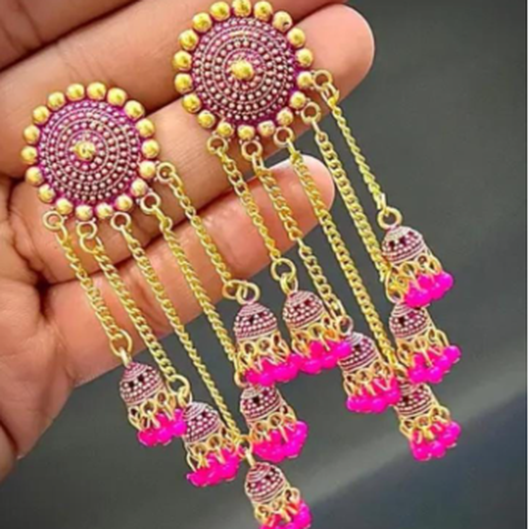 traditional long tassel jhumka earrings gold design
