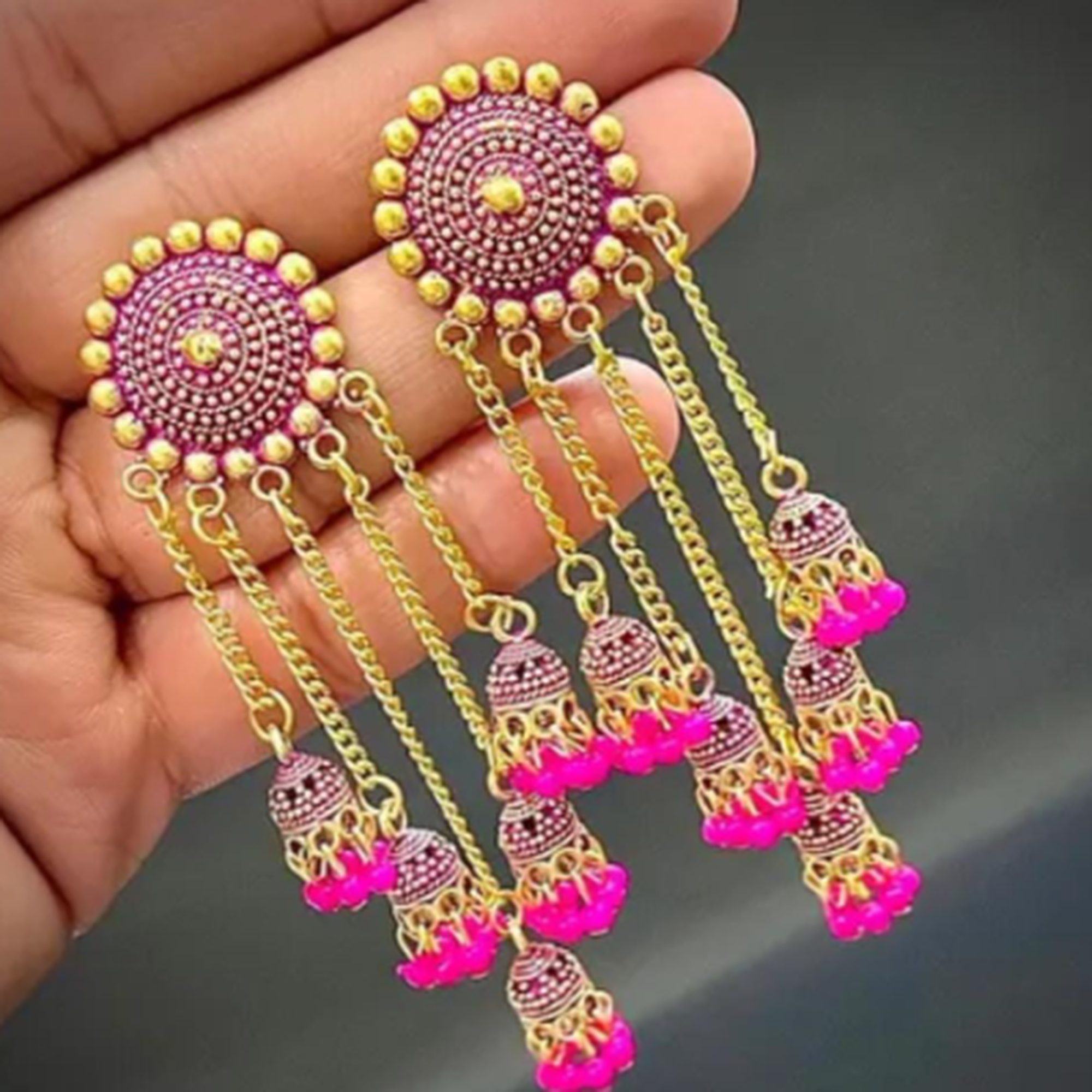 traditional long tassel jhumka earrings gold design